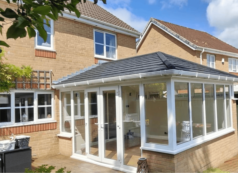 A house with a large patio and two windows.